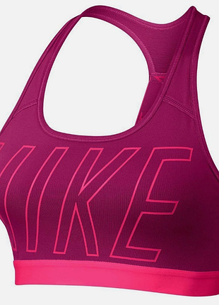 Яскраво-рожевий спортивний топ nike dri-fit — професійний бра для тренувань