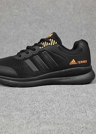Adidas terrex чёрные с оранжевым ткань сетка