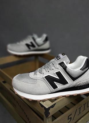 New balance 574 світло сірі на бежевій  замшасітка топ