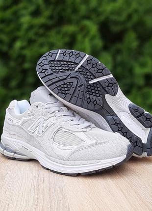 New balance 2002r protection pack світло сірі замшатекстиль