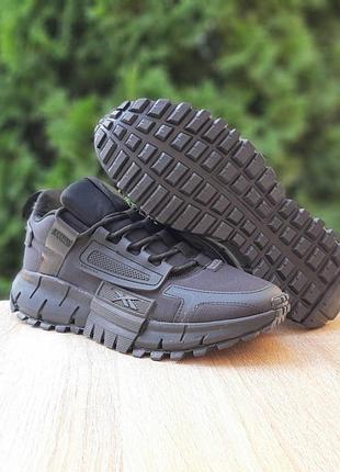 Reebok zig kinetica edge чорні щільний текстиль топ
