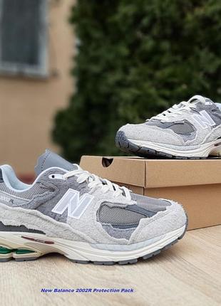 New balance 2002r protection pack сірі з зеленим замшатекстиль