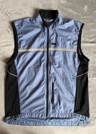 Це вінтажна спортивна жилетка nike light vest.