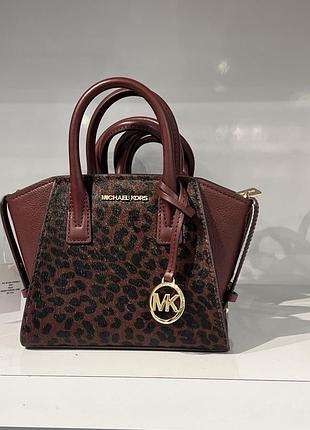 Сумка від американського бренду michael kors матеріал натуральна вставка хутро корови колір бургунді розмір 24/18/16/8