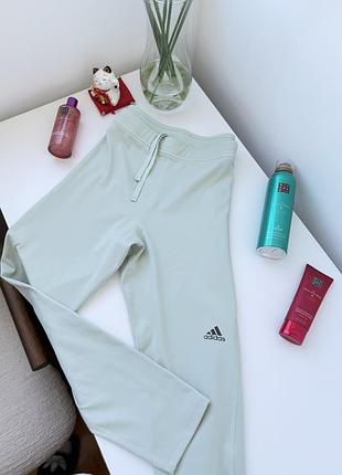Білі салатові спортивні лосини для бігу adidas