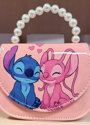 Дитяча сумочка stitch рожева з перлинною ручкою 17×13×6 см
