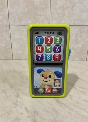 Інтерактивний іграшковий смартфон fisher-price 2-в-1 «рухайся і вчися».