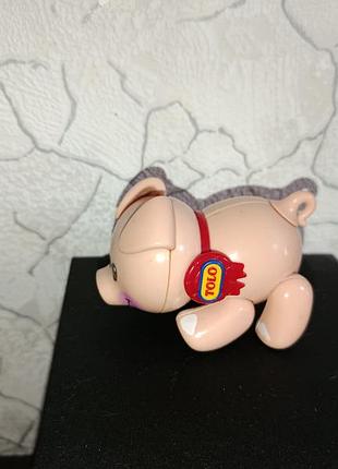 Игрушка трещалка поросенок tolo