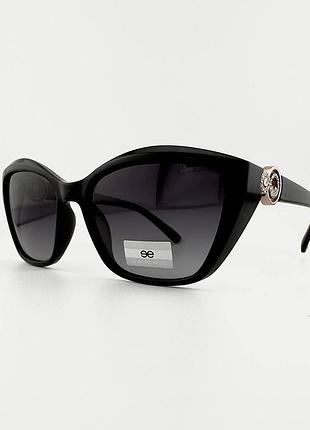Жіночі сонцезахисні окуляри eternal et3474 10-p55-с81 polarized, чорні "кошаче око"