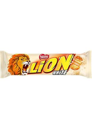 Вафлі nestle lion white з м'якою карамеллю вкриті пластівцями та білою глазур'ю 42 г