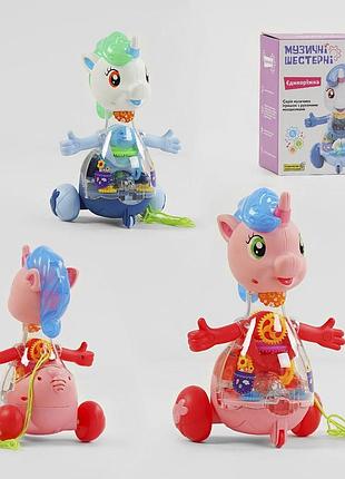 Музична єдиноріжка 32917 "wtoys", українське озвучування, шестерні, пісня, підсвічування, автоматичний рух