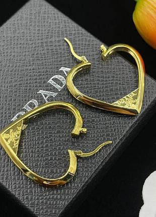 Серьги prada heart silhouette gold — люкс качество, латунь с позолотой