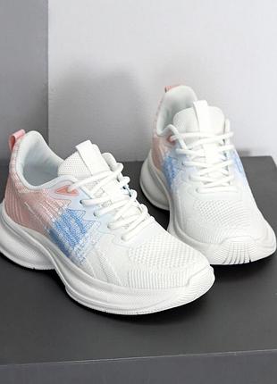 Білі текстильні кросівки