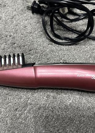 Стайлер для волосся conair — фен-щітка.