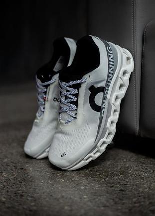 On cloudmonster 2 running white/grey 4