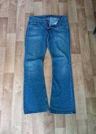 Джинсы levi's жіночі кльош