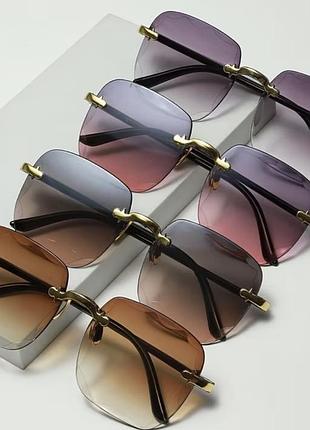Трендові жіночі сонцезахисні окуляри без оправи (rimless) квадратної форми з градієнтними лінзами та золотистою металевою фурнітурою