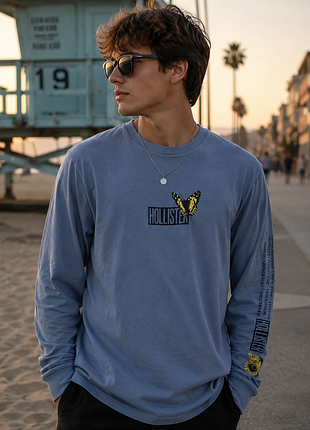 Стильний бавовняний лонгслів синього кольору у фірмовий принт hollister made in vietnam