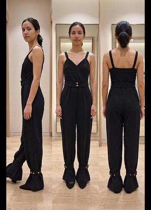 Черный комбинезон zara (размер m). состояние идеальное, одевался 2 раза. легкий и приятный к телу материал. стильный крой с поясом, подчеркивающим фигуру.