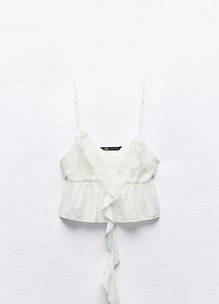 Топ zara из красивой ткани, выглядит дорого и стильно. оригинал, заказан с сайта офиц.магазина, без этикетки