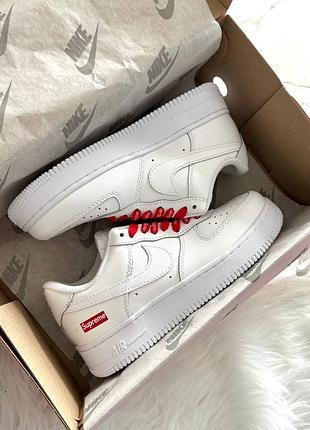 Nike air force 1 low supreme white