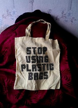 Эко сумка-шоппер  бренда topshop из натурального 100% хлопка с принтом «stop using plastic bags»