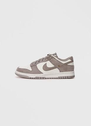 Nike dunk low у кольорі sail/malt-metallic gold
