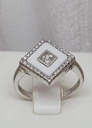 Серебряное кольцо с керамикой и фианитами. 11211222232