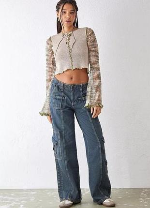 Вязаный топ urban outfitters u0 с меланжевыми
рукавами.