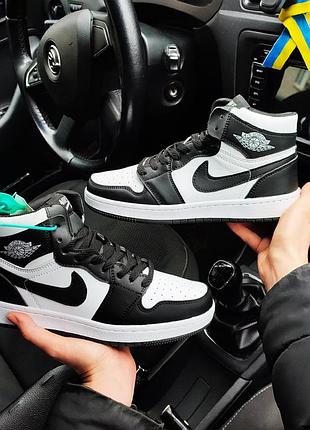 Кросівки nike air jordan 1 retro чорні з білим