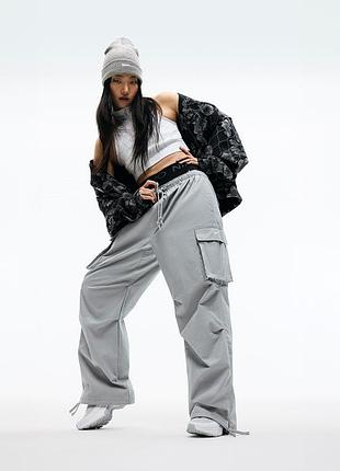 Жіночі спортивні штани-карго nike sportswear women's mid-rise oversized cargo trousers (серія nike w nsw dance)
