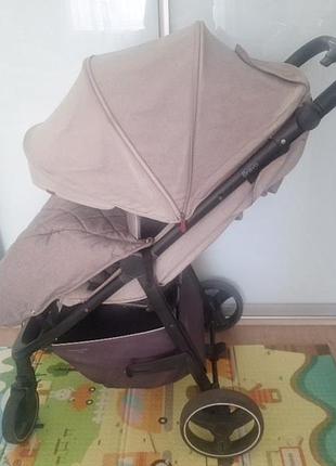 Всесезонная прогулочная коляска carello bravo