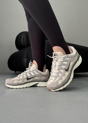 Женские кроссовки nike p-6000 se college grey light orewood