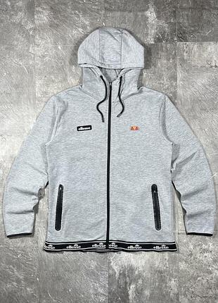Зіпка ellesse еллес сіра чоловіча кофта худі на замку з капюшоном спортивна толстовка оригінал розмір м tech fleece олімпійка світшот