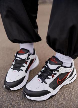 Nike air monarch black white red logo