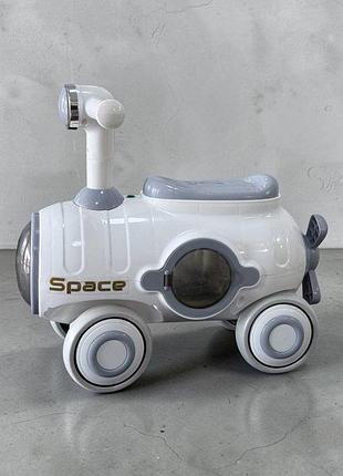 Дитячий біговел-штовхач space 619 музичний зі світловими колесами. сірий