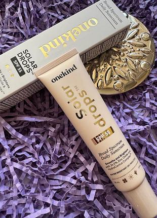 Премиальная солнцезащитная сыворотка нового поколения onekind solardrops spf 55 daily broad spectrum sunscreen, 30 ml