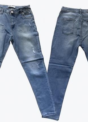 Блакитні жіночі джинси zara з потертостями м