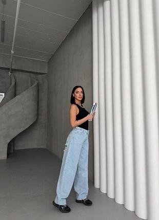 Стильні джинси wide leg із трендовими рваними вставками