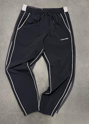 Чоловічі спортивні штани calvin klein в сірому кольорі