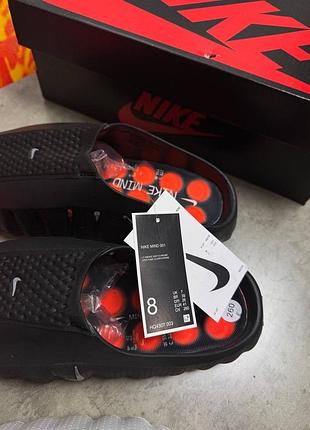 Шльопанці nike mind 4