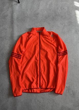 Куртка бігова для бігу adidas running  розмір с оранжевого кольору