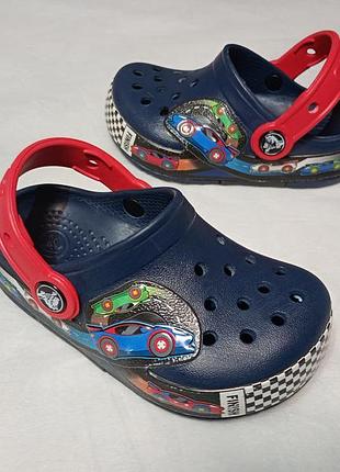 Детские сабо crocs fun lab racing clogs.цвет: темно-синий (navy) материал: 100% croslite, размер c9, eur 25-26, длина стельки 15.5 см, оригинал