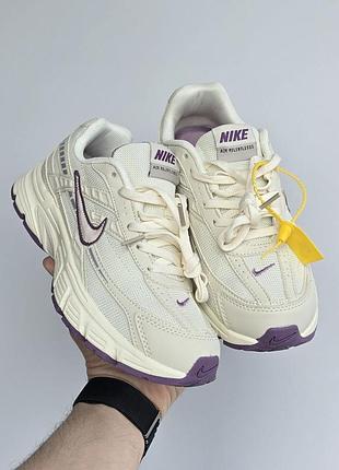 Nike initiator
• cream / purple •