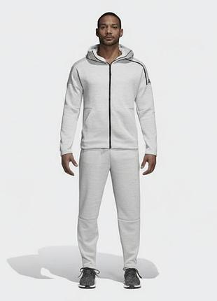1200 грн . 
чоловічий спортивний костюм adidas z.n.e.  у світло-сірому кольорі.
розмір s
стан ідеальний
заміри кофтини
пог 53см в тягнеться