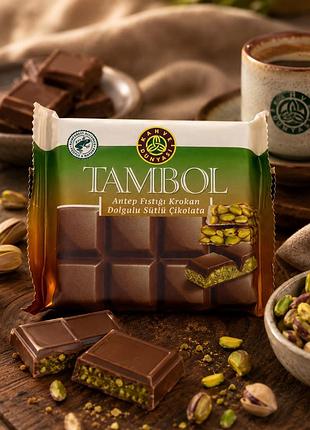 Шоколад tambol с фисташковой начинкой и крокантом | турецкий молочный шоколад kahve dünyası