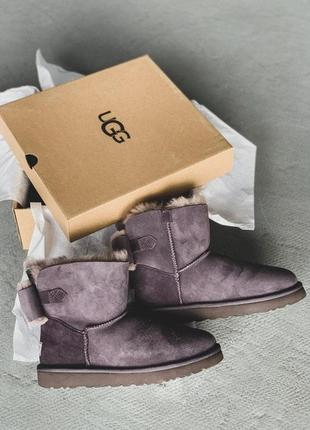 Зимові чоботи ugg з бантом у фіолетовому кольорі8 фото