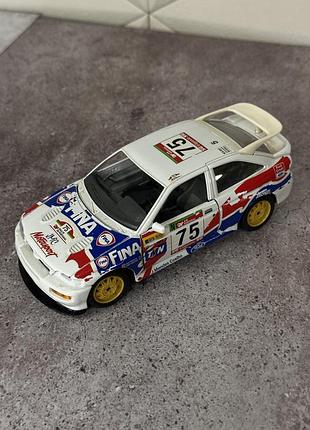 Колекційна масштабна модель автомобіля ford escort rs cosworth номер 75 fina bburago  масштаб 1:24