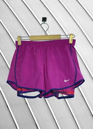 Женские фиолетовые спортивные шорты nike s m оригинал двойные шорты с велосипедками беговые фитнес шорты с карманом найм стан отличный 44 46