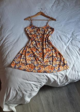 Жіночий літній сарафан помаранчевого кольору з квітковим принтом h&m